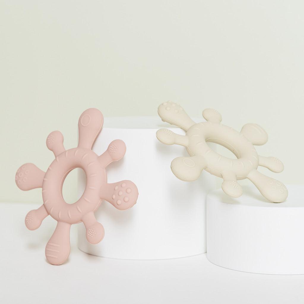 Ollie and Zara Snowflake Silicone Teether displayed